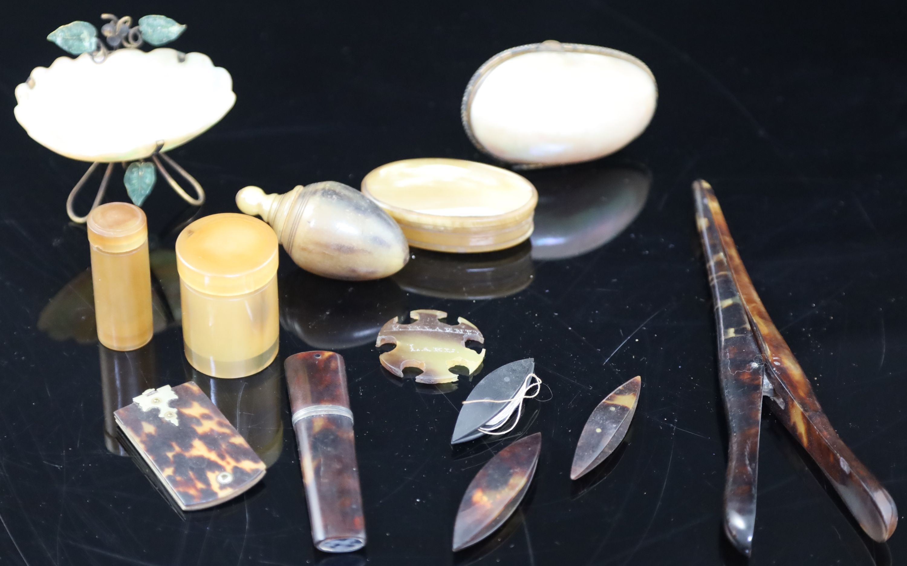 A collection of assorted tortoiseshell, horn and mother of pearl sewing accessories and other items